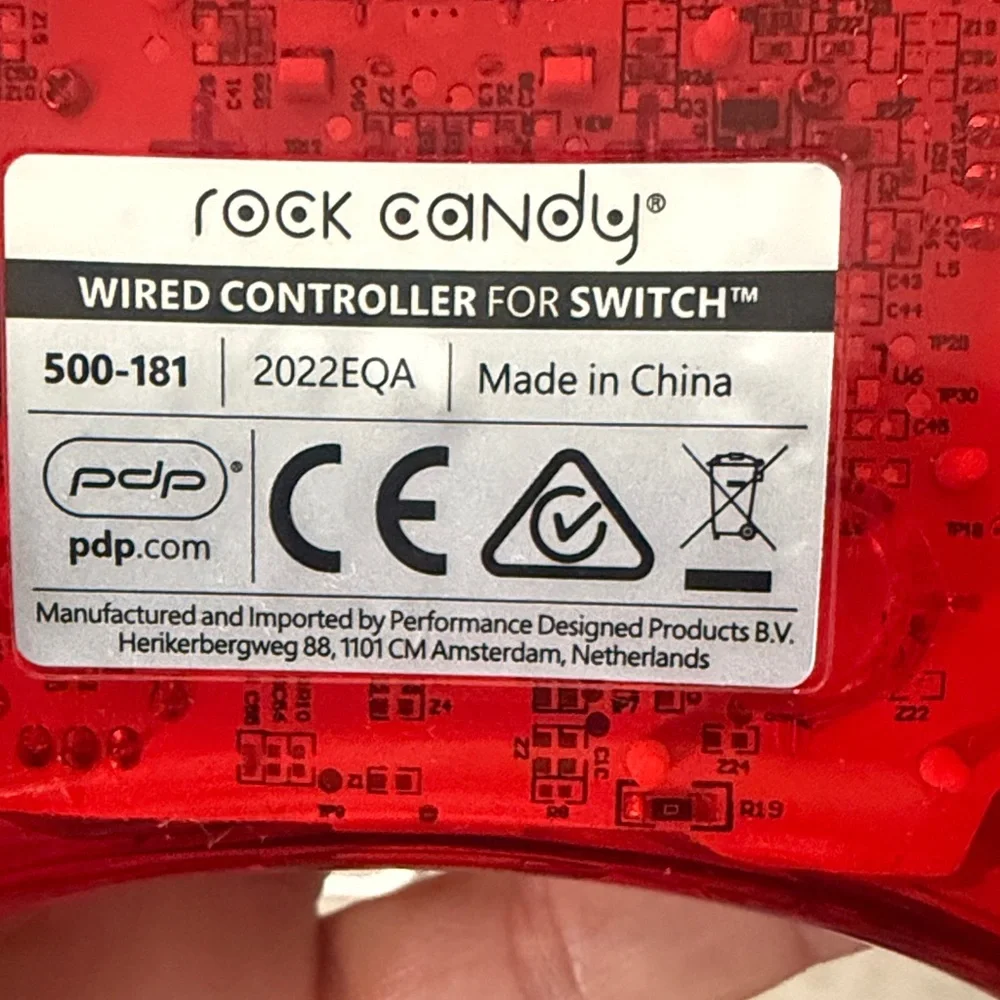 Nintendo Switch Red and Blue Controller with Mario Graphic